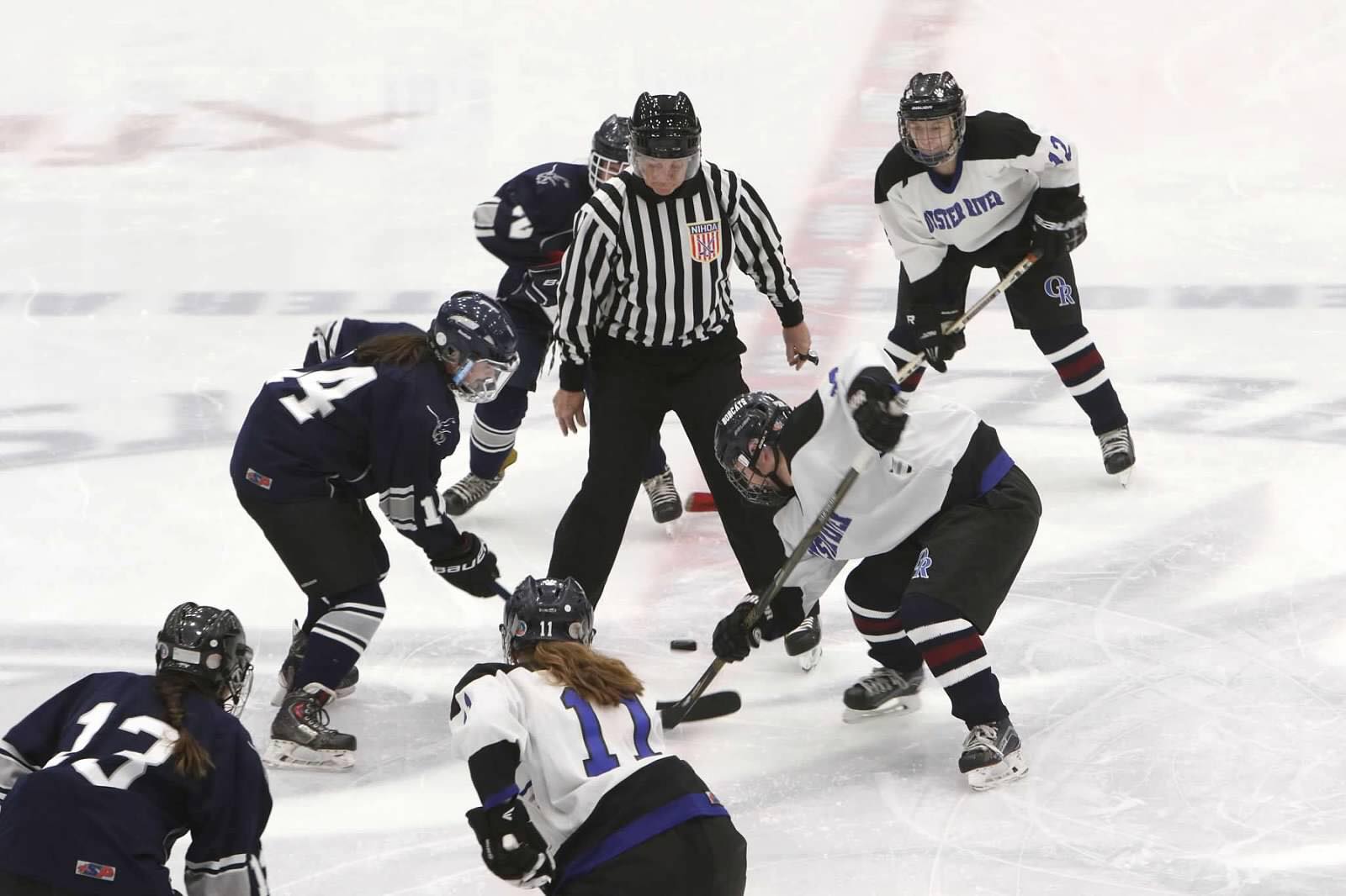 girls hockey face off