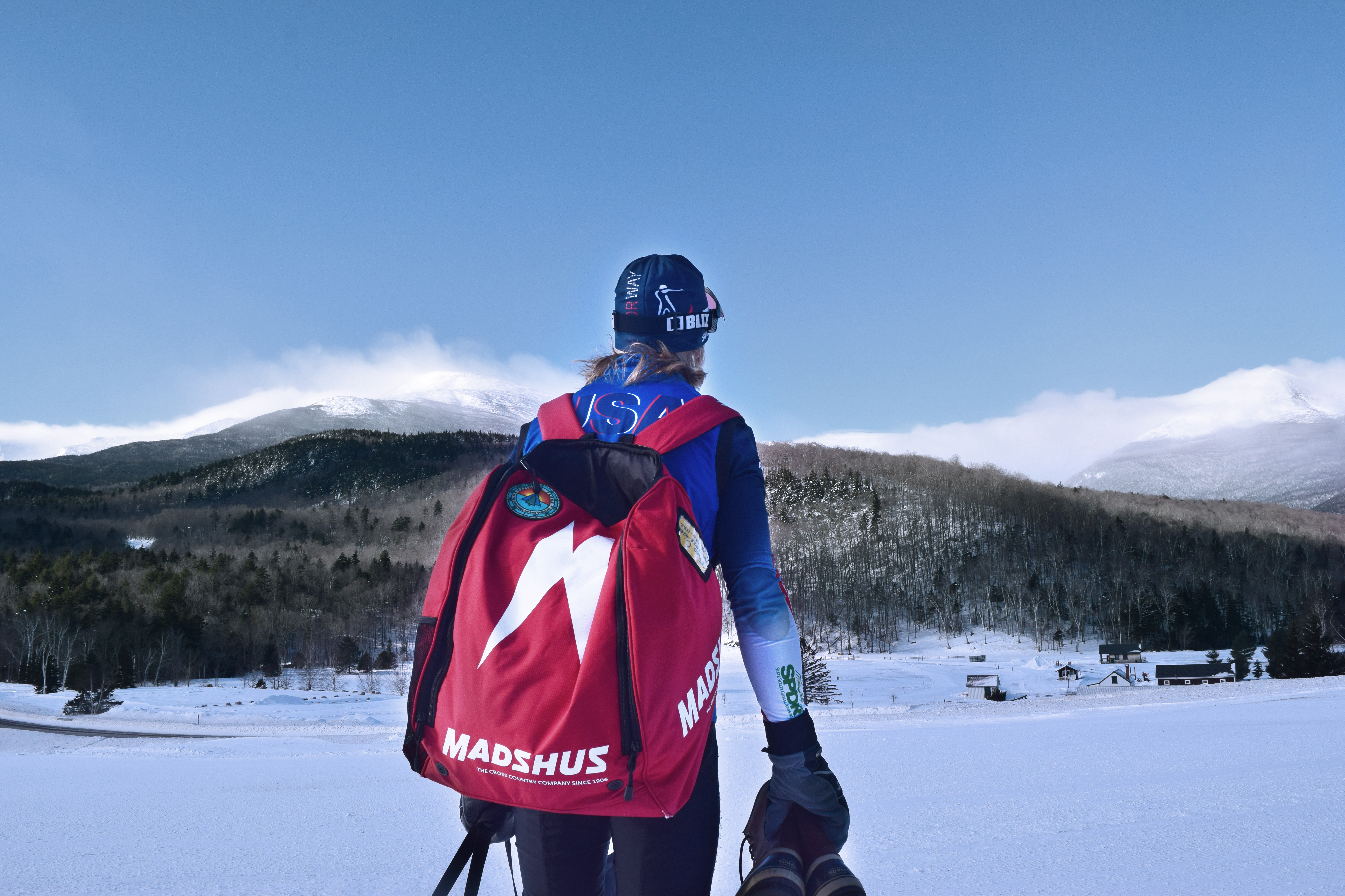 backpack and mountains LESS BLUE